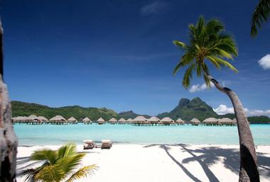Bungalows with Glass Table Tops at Bora Bora Pearl